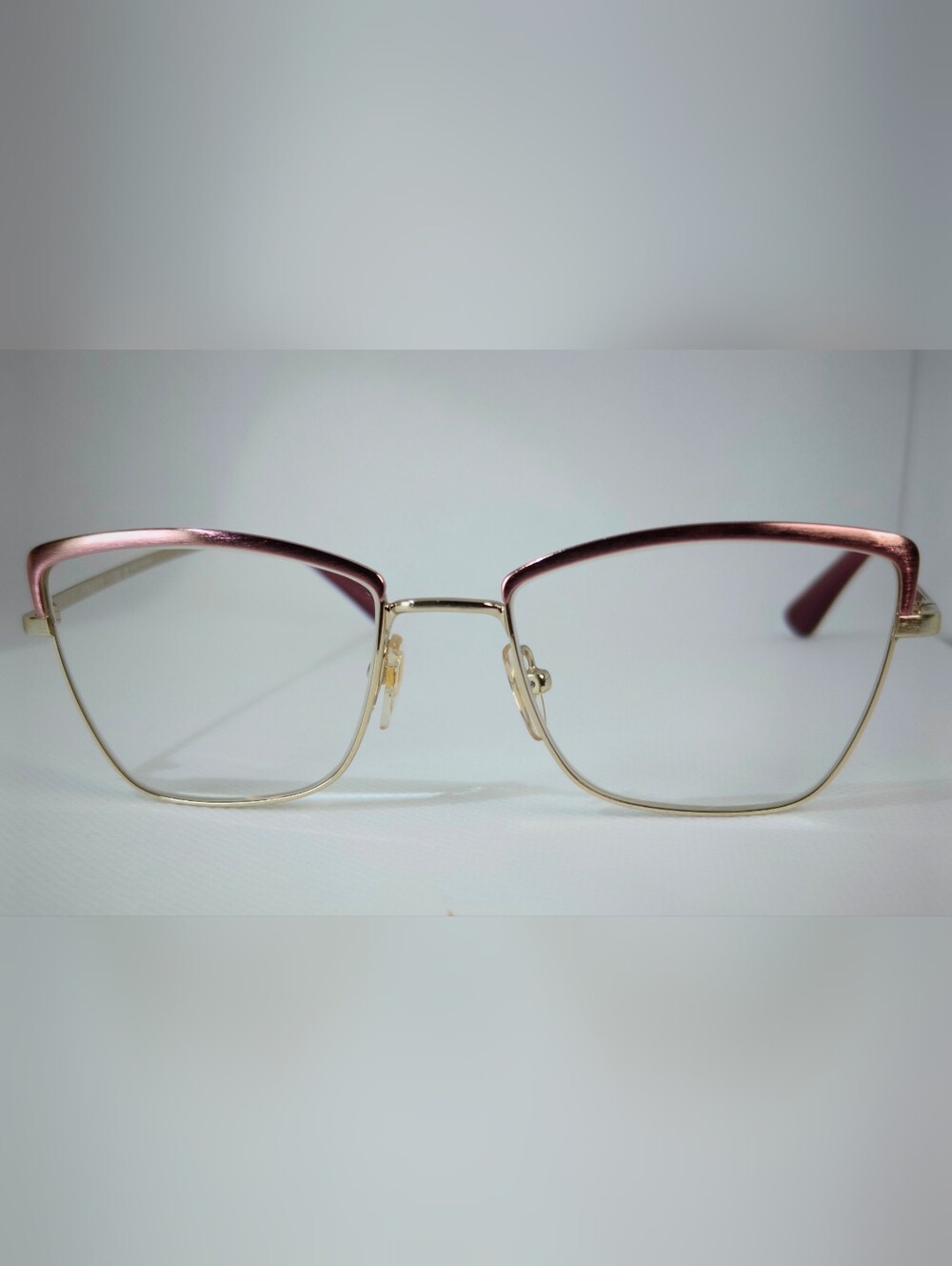 Vogue. Stylish Cat-Eye Metal Frame Glasses in Rose Gold Silk Texture.